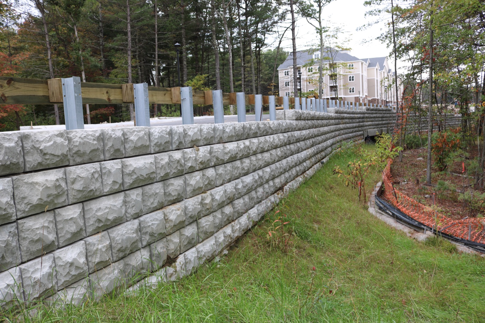 Verti-Block retaining wall with fence on top
